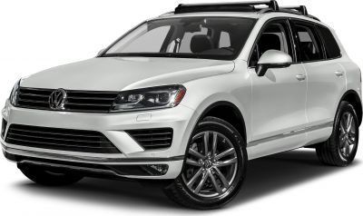 Front side view of mid-size SUV with sleek headlights and alloy wheels