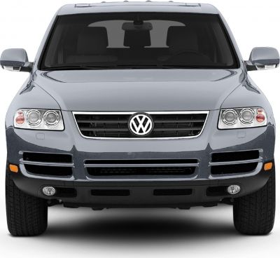 Front fascia with grille, headlights, fog lights, and side mirrors