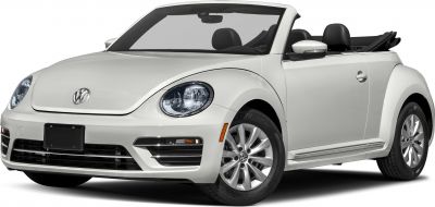 Front angle of a convertible with round headlights and alloy wheels