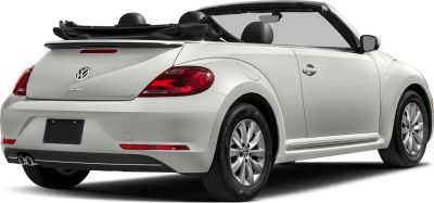 Rear view of convertible with open roof and dual exhaust