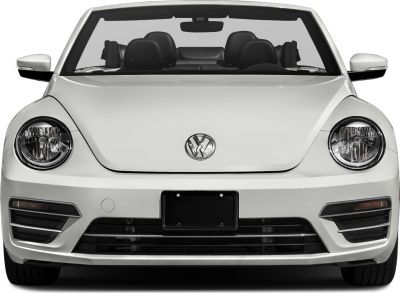 Front view with round headlights and prominent grille