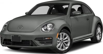 Front-side view with round headlights and alloy wheels