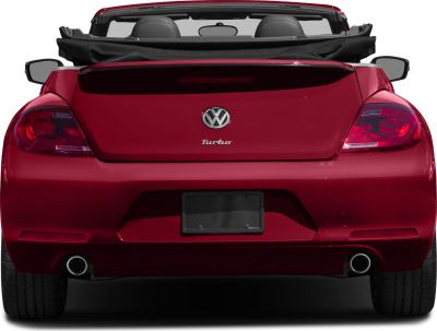 Rear view of a red convertible with dual exhausts and distinctive taillights.