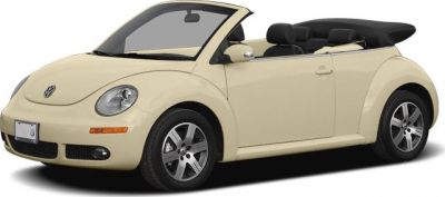 Beige convertible with soft top, alloy wheels, retro styling