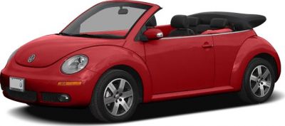 Red convertible with soft-top roof and retro-modern rounded design