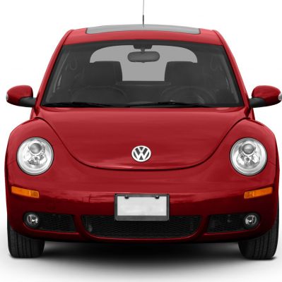 Front view of red car with round headlights and fog lights