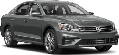 Front side view of sedan with alloy wheels and modern headlights