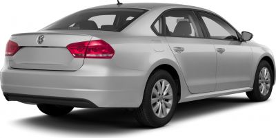 Rear and side profile of a silver sedan with distinct taillights and alloy wheels.