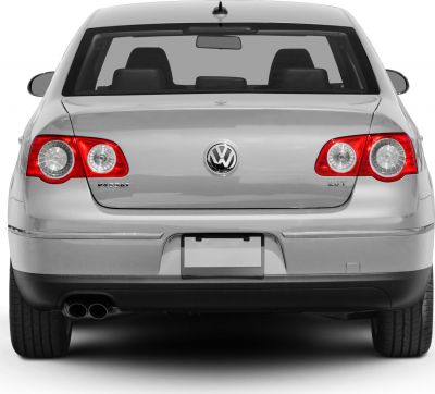Rear view with distinctive round tail lights and dual exhaust.