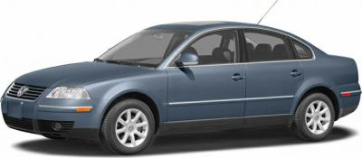 Blue mid-size sedan with alloy wheels and classic grille design