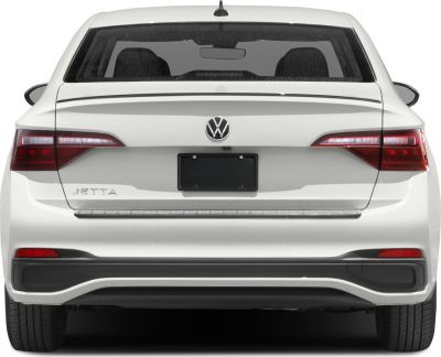 Rear view of a modern white sedan with sleek LED taillights and sharp lines