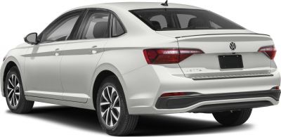Rear side view with sculpted rear lights and alloy wheels