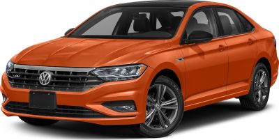 Front grille and headlight design with alloy wheels in bright orange sedan