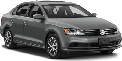 Gray sedan with alloy wheels and chrome-accented grille