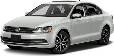 Front fascia with headlights, grille, and alloy wheels on white sedan