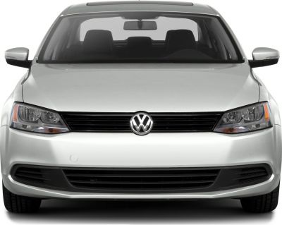 Front view with grille, headlights, and side mirrors