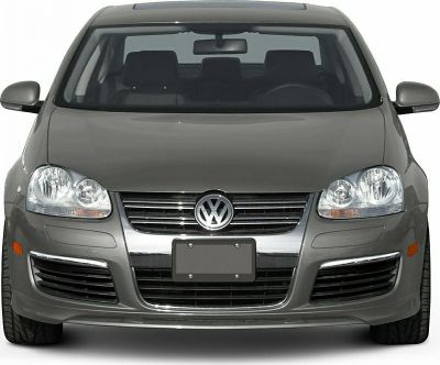 Front view with grille, headlights, and VW emblem