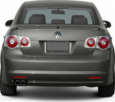 Dual exhaust, circular tail lights, rear spoiler on rear car view