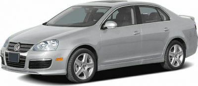 Silver sedan with sleek body and alloy wheels in front-side angle