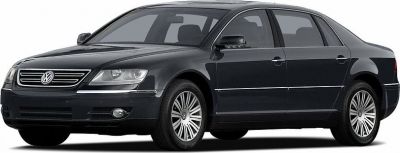 Black luxury sedan, side front view with prominent grille and alloy wheels