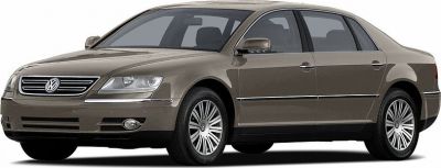 Luxury sedan front side profile with extended wheelbase and alloy wheels