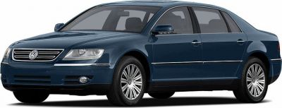 Luxury sedan with elongated wheelbase, alloy wheels, and front grille.