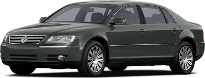 Front side view of a luxury sedan with alloy wheels and chrome side trim.
