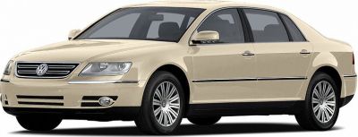 Front-side perspective of luxury large sedan with alloy wheels and beige finish