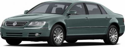 Front and side profile of a luxury sedan with distinctive grille and multi-spoke wheels