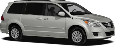 Side profile of a minivan with sliding doors and chrome grille
