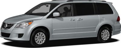 Silver minivan with sliding doors and alloy wheels side view