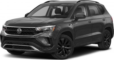 Front-side view of SUV with black alloy wheels and hexagonal grille