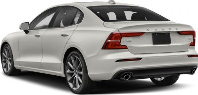 Rear side profile with distinct taillights and dual exhausts.