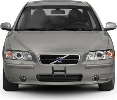 Front view with grill, headlights, and fog lights
