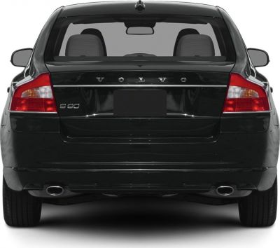 Rear view with dual exhaust and distinctive taillights.