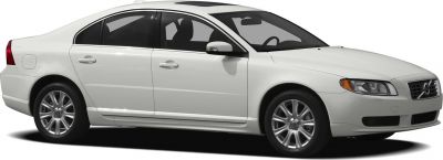 White luxury sedan side profile with alloy wheels and sleek headlights