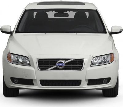 Front view with distinctive grille and headlight design