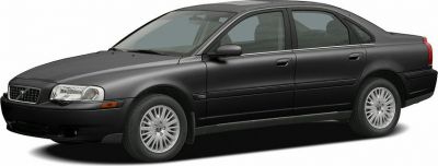 Side view of elongated luxury sedan stretch limousine with four doors.
