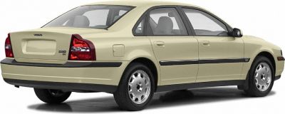 Rear and side profile of a classic sedan with distinct tail lights and four doors