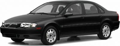 Black sedan with chrome rims, front-side view, classic 1990s design