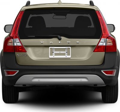 Rear view of a SUV with prominent vertical tail lights and rear windshield wiper.