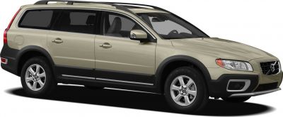 Beige station wagon with roof rails and alloy wheels