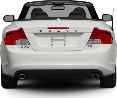Rear of a white convertible with distinct taillights and dual exhausts