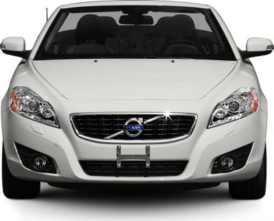 Front view featuring grille, headlights, fog lights, and smooth hood design.