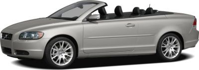Silver convertible with open roof and alloy wheels side view