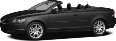 Black two-door convertible with soft top roof and alloy wheels