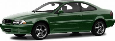 Green two-door coupe with alloy wheels and sleek 1990s design