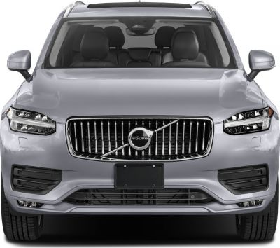 Front view with vertical grille and T-shaped LED headlights
