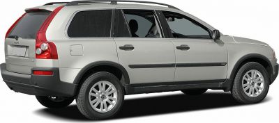 Side rear view of a mid-2000s SUV with distinct taillights and alloy wheels