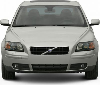 Front view with grille, headlights, and fog lights of a sedan